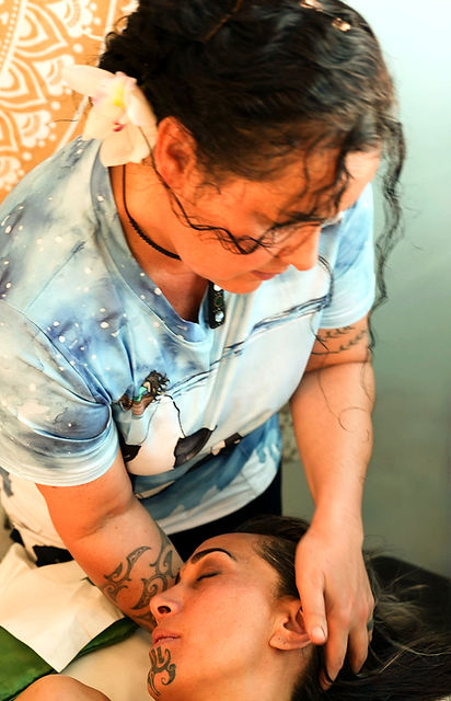 Ardre performing Cultural Bodywork massage